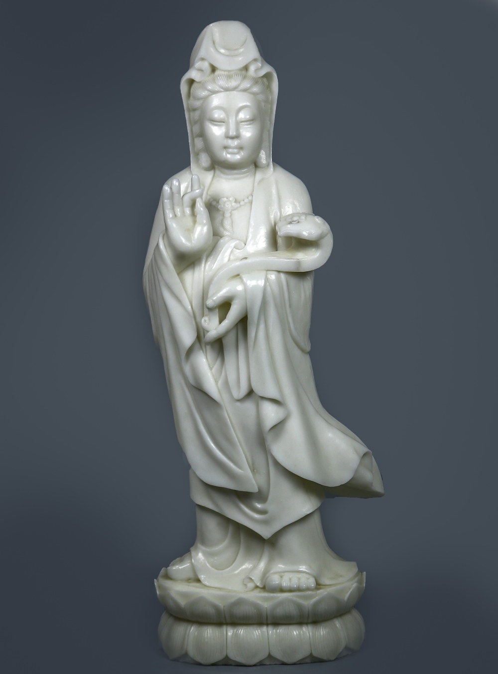 Chinese large stone sculpture of Guanyin, the standing bodhisattva holding a ruyi scepter, 39"h