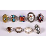 (Lot of 9) Multi-stone, sterling silver, silver and metal rings Including 1) inlaid, sterling silver