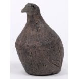 Folk art clay partridge statuette, the stylized figure with incised plumage, 4" x 23.5"dia.