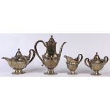 (lot of 4) Tiffany and Co. sterling silver tea set, consisting of a teapot, 7"h x 10"w x 5"d, a