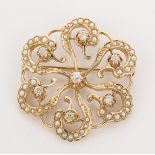 Diamond, seed pearl and 14k yellow gold brooch Featuring (7) old European-cut diamonds, weighing a