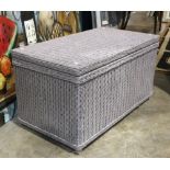 Wicker blanket chest, having a glass top, 19"h x 36"w x 19.5"d