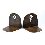Pair of Dirk Van Erp hand-hammered "poppy" bookends circa 1915, each with a pierced floral motif,