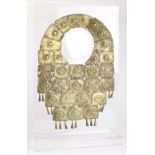 Segmented brass pectoral, Northern Coastal Peru, age unknown, having (7) segments with figures