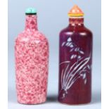 (lot of 2) Chinese porcelain snuff bottles, 19th/early 20th century, each with a tall cylindrical
