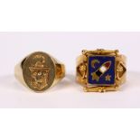 (Lot of 2) Enamel and yellow gold rings Including (1) enamel and 18k yellow gold rocket ring,