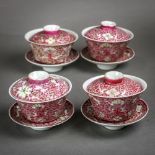 (lot of 4) Set of Chinese enameled porcelain lidded cups with saucers, each with stylized louts