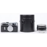 (lot of 3) Canon camera group, consisting of a Canon Model 7 black and chrome camera body, a 50mm