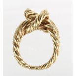 14k yellow gold ring The 14k yellow gold rope twist, knot motif ring, measures approximately 20 mm