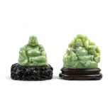 (lot of 2) Chinese Buddhist hardstone sculptures: the first, of Budai wearing a loose robe sitting