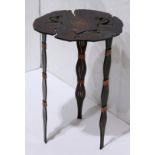 Southwest metal custom occasional table, having figural reserves in the top flanking the central
