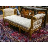 Louis XV style giltwood lit du jour, having two outswept arms, continuing to a cream upholstered
