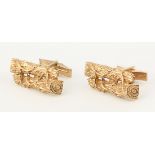 Pair of 14k yellow gold cufflinks Designed as (2) logs, measuring approximately 28 X 11 mm,