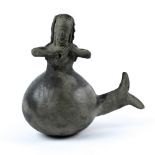 Chimu blackware ceramic "mermaid" vessel, Northern Coastal Peru (1100 - 1470 A.D.), depicting a