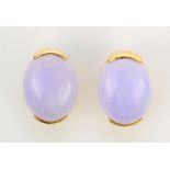 Pair of jadeite and 18k yellow gold earrings Featuring (2) oval lavendar jadeite cabochons,