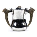 Shreve & Co. sterling silver loving cup, having three antler bone handles, frame the inscription "