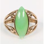 Jadeite and 14k yellow gold ring Featuring (1) navette shaped jadeite cabochon, measuring