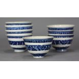 (lot of 8) Chinese underglazed blue porcelain cups, of inverted bell form decorated with a scroll