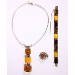 Amber, sterling silver and silver jewelry suite Including 1) necklace, featuring (3) cubed amber