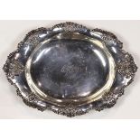 Tiffany & Co. sterling silver serving dish, circa 1891-1902, of an oval form with the sinuous border