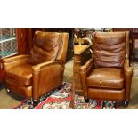 Pair of brown leather reclining club chairs, having brass nail head accents, 40"h x 30.5"w x 36"d