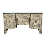 Hollywood Regency style mirrored desk, having two doors with a fitted slide out interior and