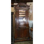 Edwardian hall tree, with brass mounts framing the rectangular beveled looking glass, 9'h x 3'w