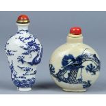 (lot of 2) Chinese porcelain snuff bottles: the first with a flattened circular body decorated