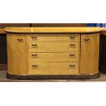 David Marks, wenge and quilted maple sideboard, 1994/95, having a shaped top, above the eight drawer