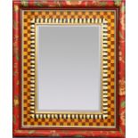 Mackenzie Childs hand painted mirror, having a molded crimson border surrounding the checker board