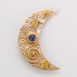 Sapphire, yellow gold crescent brooch Designed as a crescent moon, measuring approximately 40 X 25