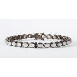 Labradorite and blackened silver bracelet Featuring (30) oval labradorite cabochons, measuring