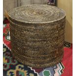 Lidded wicker basket, of circular form with a glass top, 20"h x 23"dia.