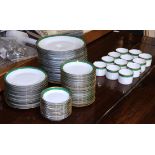 (lot of 75) Richard Ginori Dalermo green table service, having a gilt rim with a green border,