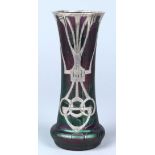 Art Nouveau silver overlaid iridescent art glass vase circa 1920, having a tapering form with