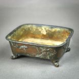 Japanese bronze censer, 19th century, rounded rectangular form on four supports, side with molded