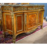 Louis XVI style bronze mounted commode, having a shaped marble top above the conforming case