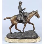 Charles Marion Russell (American, 1864-1926), "Will Rogers," bronze sculpture, signed lower right (