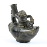 Chimu ceramic blackware stirrup vessel, Central Coastal Peru (1476-1522 AD), a kneeling man