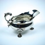Victorian silver sauceboat, London 1845, by Fox and Fox, having an exaggerated spout and scallop