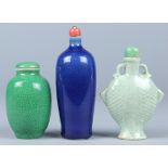 (lot of 3) Chinese snuff bottles: one of an ovoid body with green crackle glaze; another, of celadon