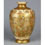 Japanese Satsuma vase, short neck and foot on ovoid body, decorated with textured rakan and Kannon