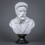 Continental marble bust, depicting a gentleman gazing outward with a beard, dressed in a jacket with