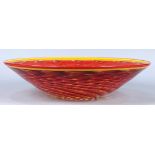Dan and Joi La Chausseé Red Plate art glass bowl, having a pulled red and yellow body, underside
