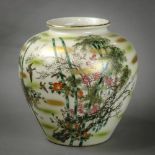 Japanese Kutani ceramic vase, depicting birds soaring amid bamboo, cherry blossoms, plum blossoms,