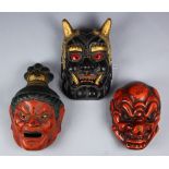 (lot of 3) Japanese wooden masks for gigakumen (ancient mask show): two vermilion lacquered,