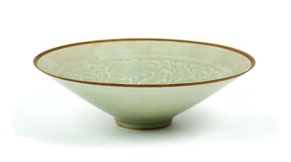 Chinese qingbai glazed ceramic bowl, the interior featuring a dragon and phoenix amid clouds, raised - Image 2 of 4