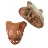 Chimu Redware Feline Mold, the face with large eyes, ears, whiskers, teeth, a prognathic snout,