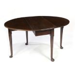 Georgian style mahogany drop leaf table, having a rectangular top, and rising on pad feet, 28"h x