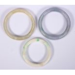 (Lot of 3) Jadeite bracelets Including 1) jadeite bangle, measuring approximately 8.2 mm in width,